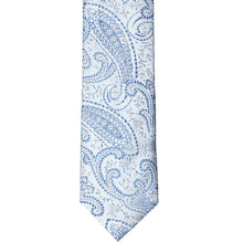 Load image into Gallery viewer, The front tip of a pastel blue paisley slim tie