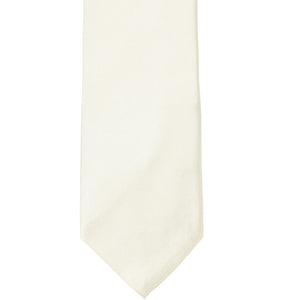 The front of a pearl colored solid tie, laid out flat