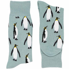 Load image into Gallery viewer, A pair of gray folded socks with large emperor penguins