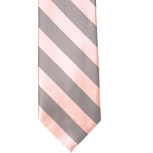 Load image into Gallery viewer, The front of a petal and portobello striped tie, laid out flat