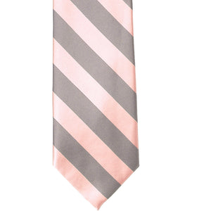 The front of a petal and portobello striped tie, laid out flat