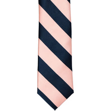 Load image into Gallery viewer, The front of a petal and navy striped tie, laid out flat