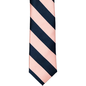 The front of a petal and navy striped tie, laid out flat