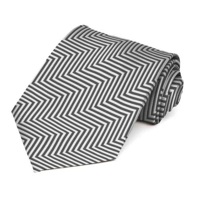Rolled view of a gray and white chevron striped tie