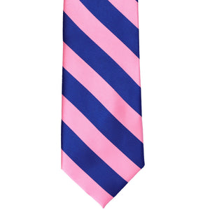 The front of a royal blue and pink striped tie