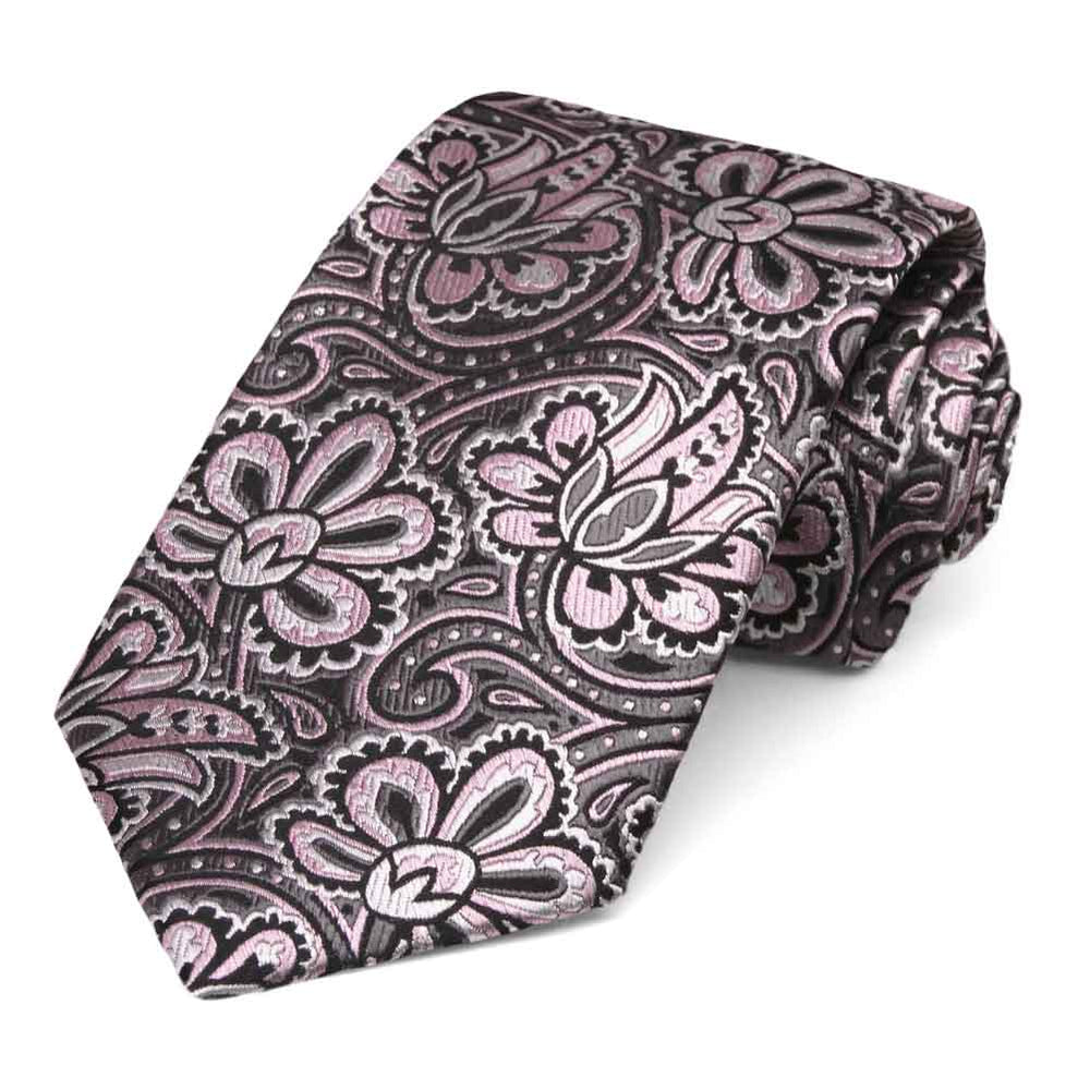 Pink and gray large print floral necktie, rolled to show texture