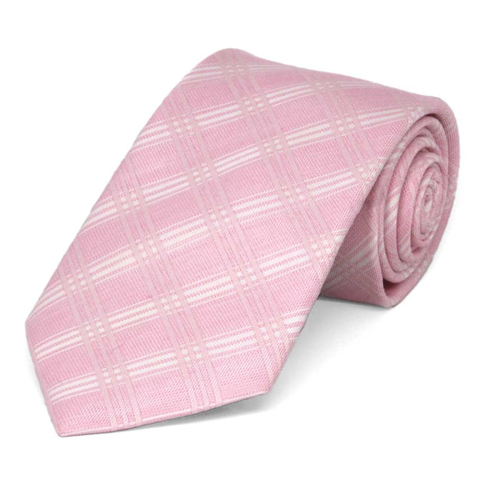 A pink and white plaid necktie, rolled to show texture