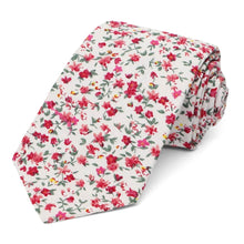 Load image into Gallery viewer, A fuchsia and white small floral design tie, rolled to show off the pattern