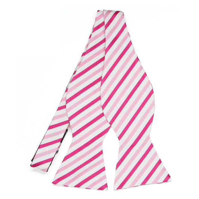 An untied pink and white striped self-tie bow tie