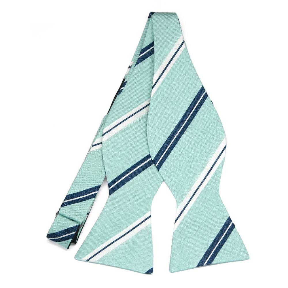 An untied light turquoise self-tie bow tie with white and blue stripes
