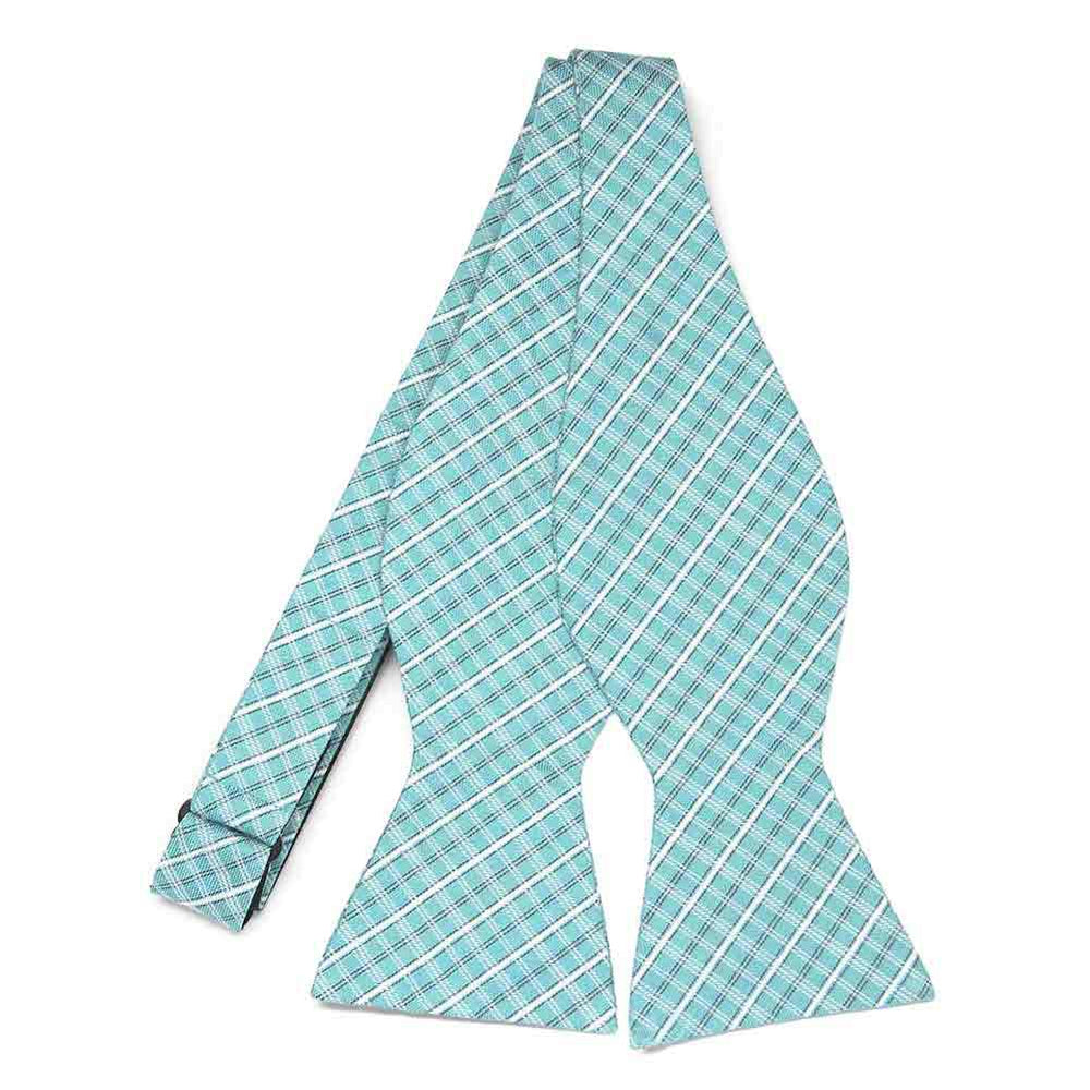 An untied aqua and white plaid self-tie bow tie