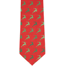 Load image into Gallery viewer, Front view of a red Christmas necktie with green prancing reindeer