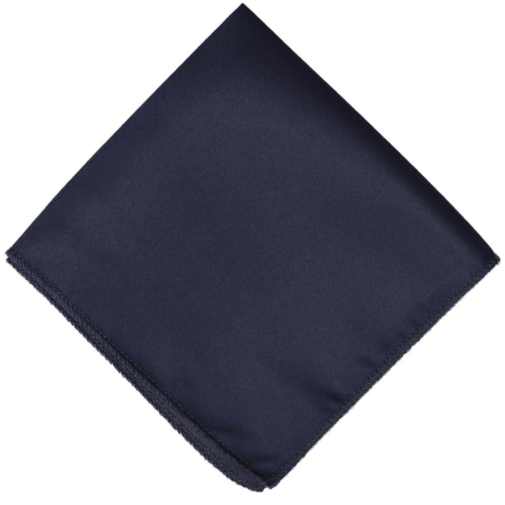 Dark insignia blue pocket square folded into a diamond