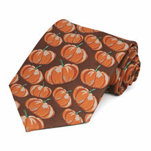 Load image into Gallery viewer, Pumpkin motif tiled on a brown tie.