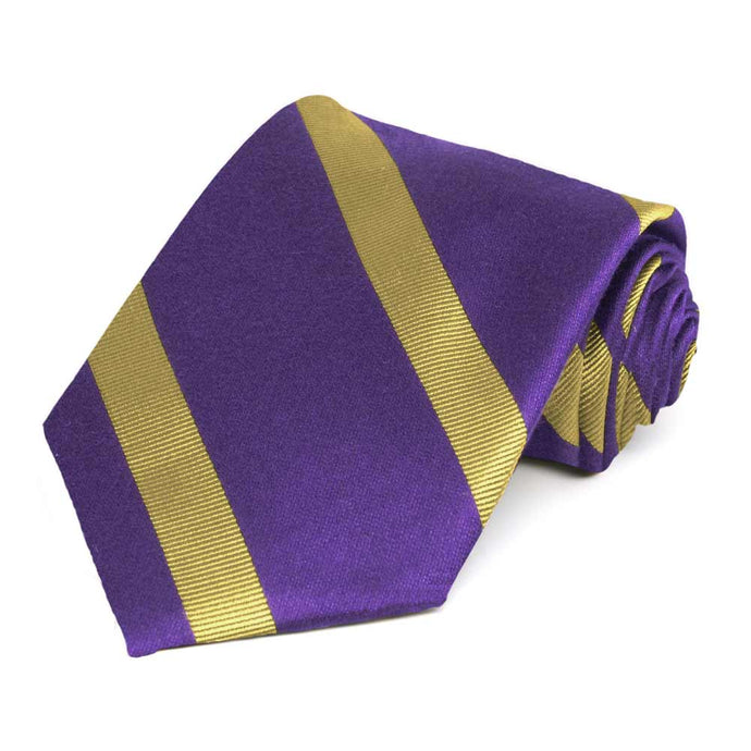 Rolled view of a purple and gold striped extra long tie