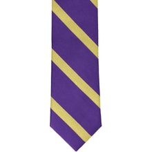 Load image into Gallery viewer, Front, bottom view of a purple and gold striped narrow tie