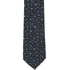 The front of a purple and turquoise slim floral tie, laid out flat