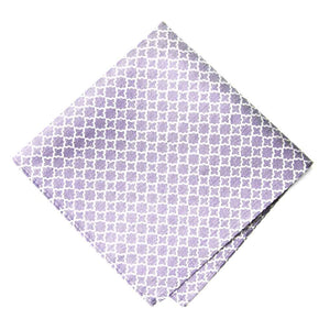 A folded light purple pocket square with a white trellis pattern