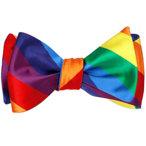 A tied self-tie bow tie in rainbow colors