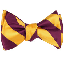 Load image into Gallery viewer, Raspberry and bright gold striped self-tie bow tie, tied