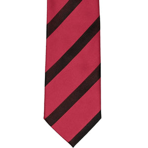 The front of a red and black ribbed and solid striped tie