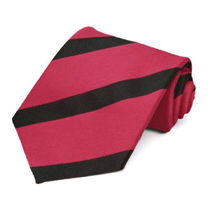 Red and black striped extra long necktie, rolled to show texture of stripes