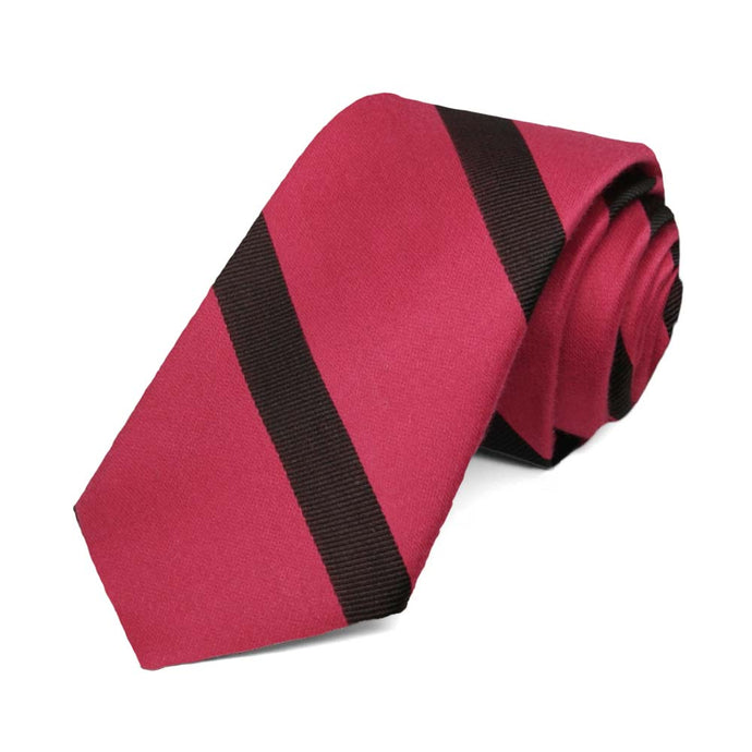 Red and black striped skinny tie, rolled to show the texture of the stripes