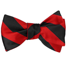 Load image into Gallery viewer, Red and black striped self-tie bow tie, tied
