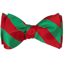 Load image into Gallery viewer, A tied red and green striped self-tie bow tie