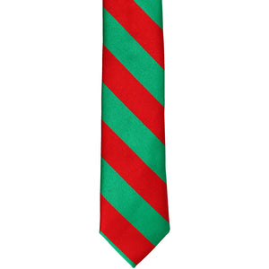 The front of a red and green striped skinny tie, laid out flat