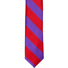 Load image into Gallery viewer, The front of a red and purple striped skinny tie, laid out flat