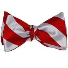Load image into Gallery viewer, Red and silver striped self-tie bow tie, tied