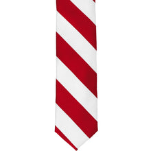 Load image into Gallery viewer, The front of a red and white striped skinny tie, laid out flat