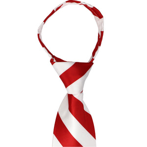 Closeup of a red and white striped zipper tie knot