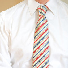 Load image into Gallery viewer, A man wearing a red, blue and off-white striped tie with a white dress shirt