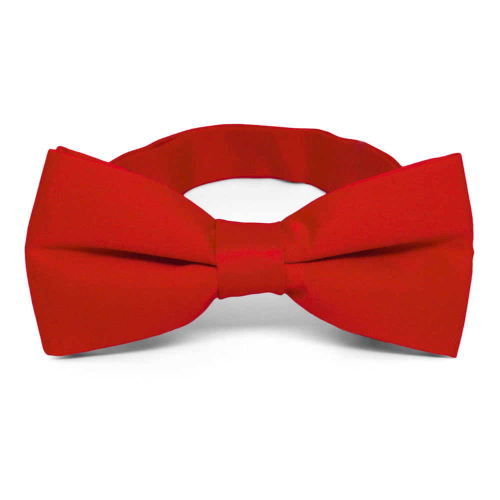 A solid red pre-tied band collar bow tie