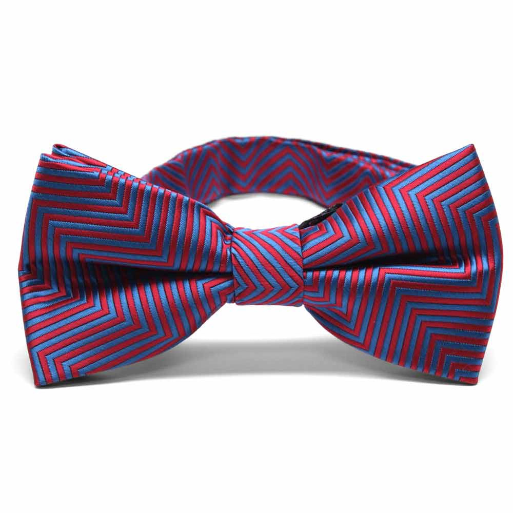 Front view of a red and blue chevron pattern bow tie
