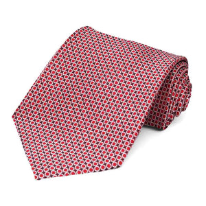 Red circle pattern necktie, rolled to show texture
