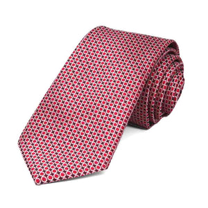 Red circle pattern slim necktie, rolled to show texture