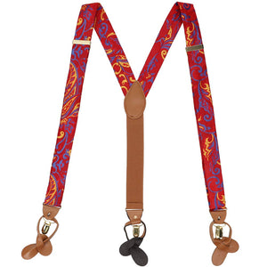 A red, yellow and blue paisley pair of suspenders, shaped into an M to show off all three straps