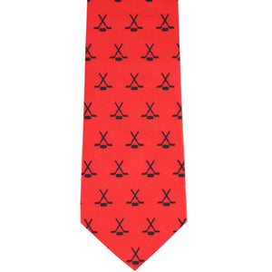 Front view red hockey stick and puck pattern necktie
