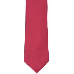 The front of a slightly muted red tie in a narrow width