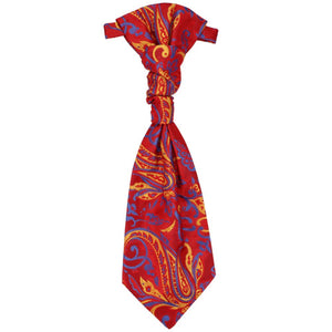 A red paisley cravat, laying flat to show off entire tie