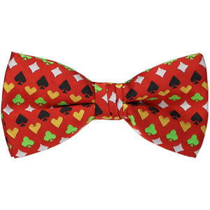 A red bow tie with a playing card suits pattern