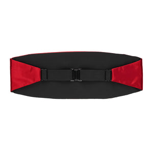 The back of a red satin cummerbund, including the black elastic strap