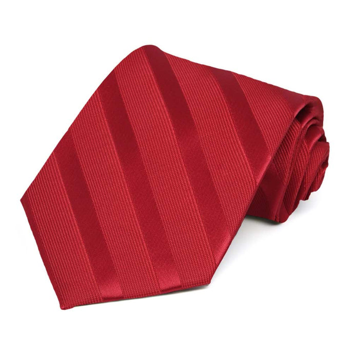 A red tone on tone striped tie, rolled to show off texture