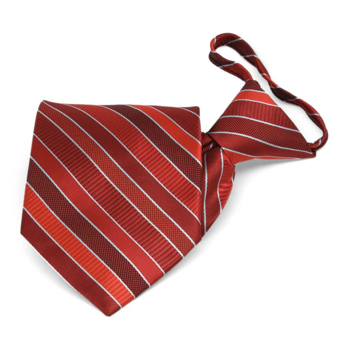 Folded front view of a red and silver striped zipper style necktie