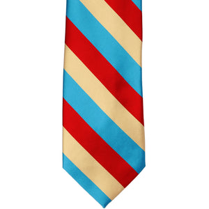 The front, tip view of a red, turquoise and pale gold striped tie