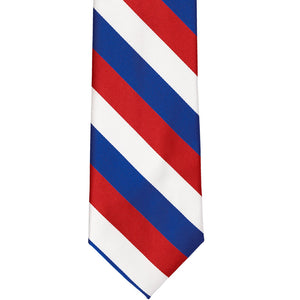 The front of a red, white and blue striped tie, laid out flat