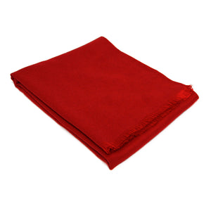 Red solid color winter scarf folded in a rectangle